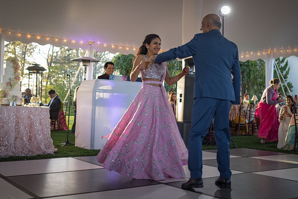 Bride and groom first dance at Indian-American wedding