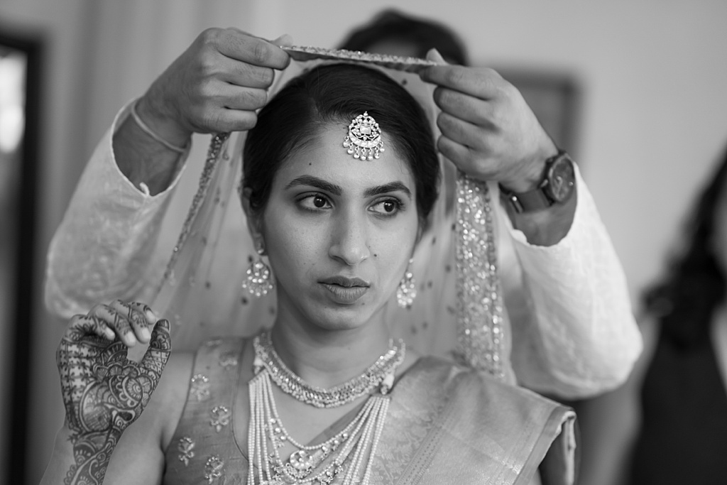 Indian bride getting ready on her wedding morning