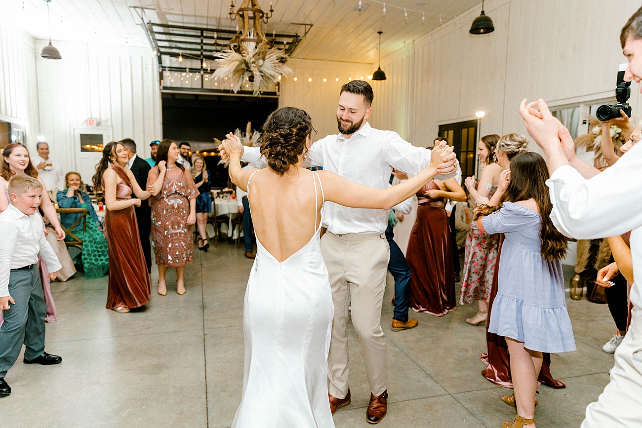 Bride and groom dancing during reception