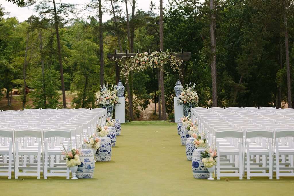 Outdoor golf course wedding ceremony decor