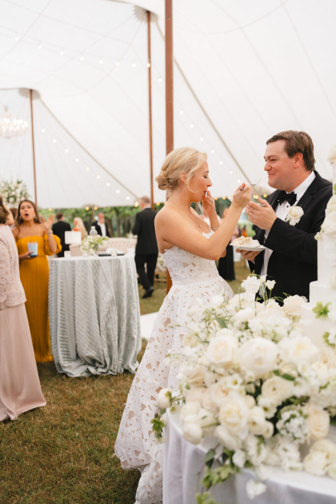 Happy bride cake cutting | South Georgia Private Estate Tent Wedding | LLC Events | Kathryn Ann Waller Photography | Albany, Georgia