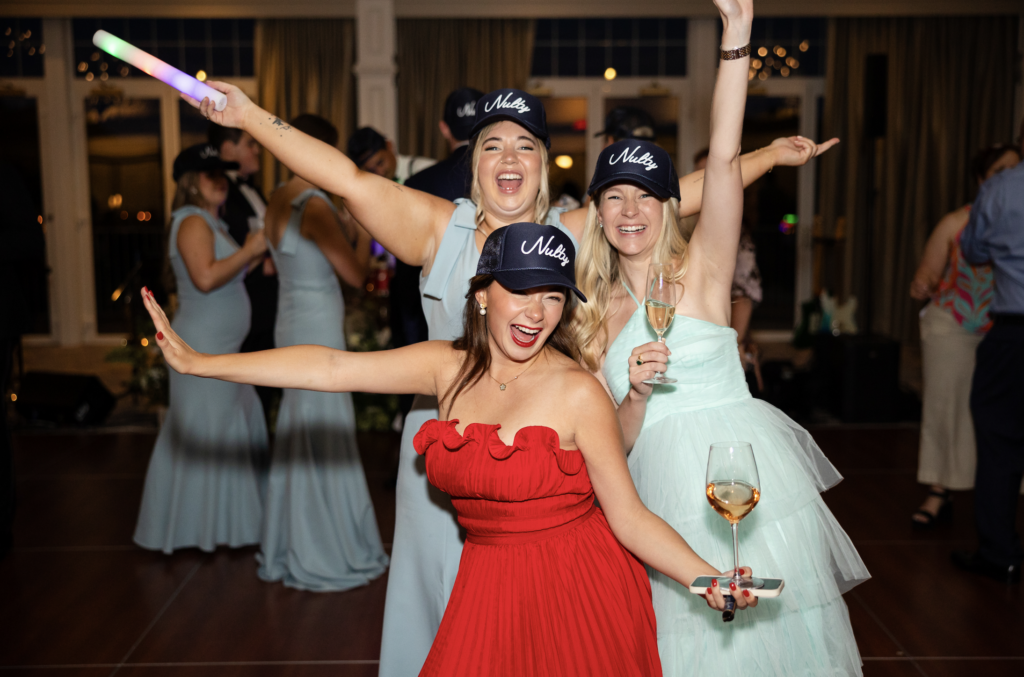 matching custom trucker hats at wedding reception