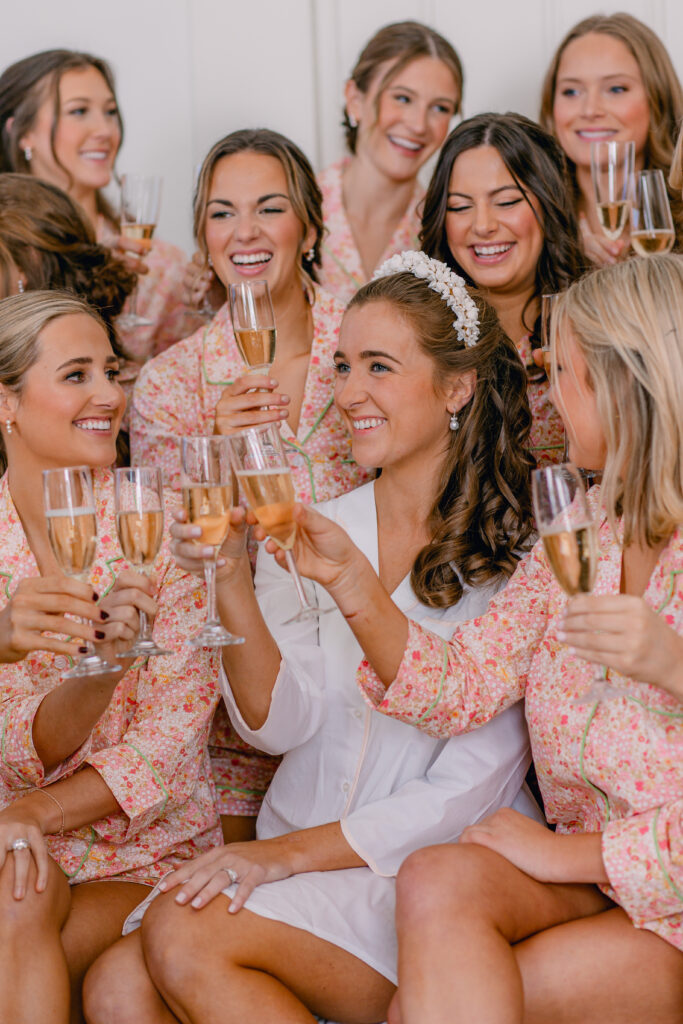 bride and bridesmaids champagne toast