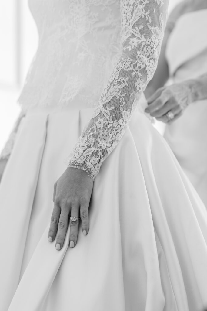 lace wedding gown and wedding ring